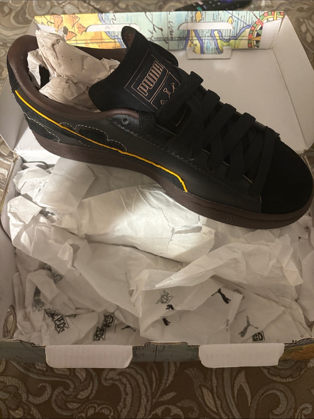 Puma Junior Black Sneaker with Brown Sole and Yellow Piping